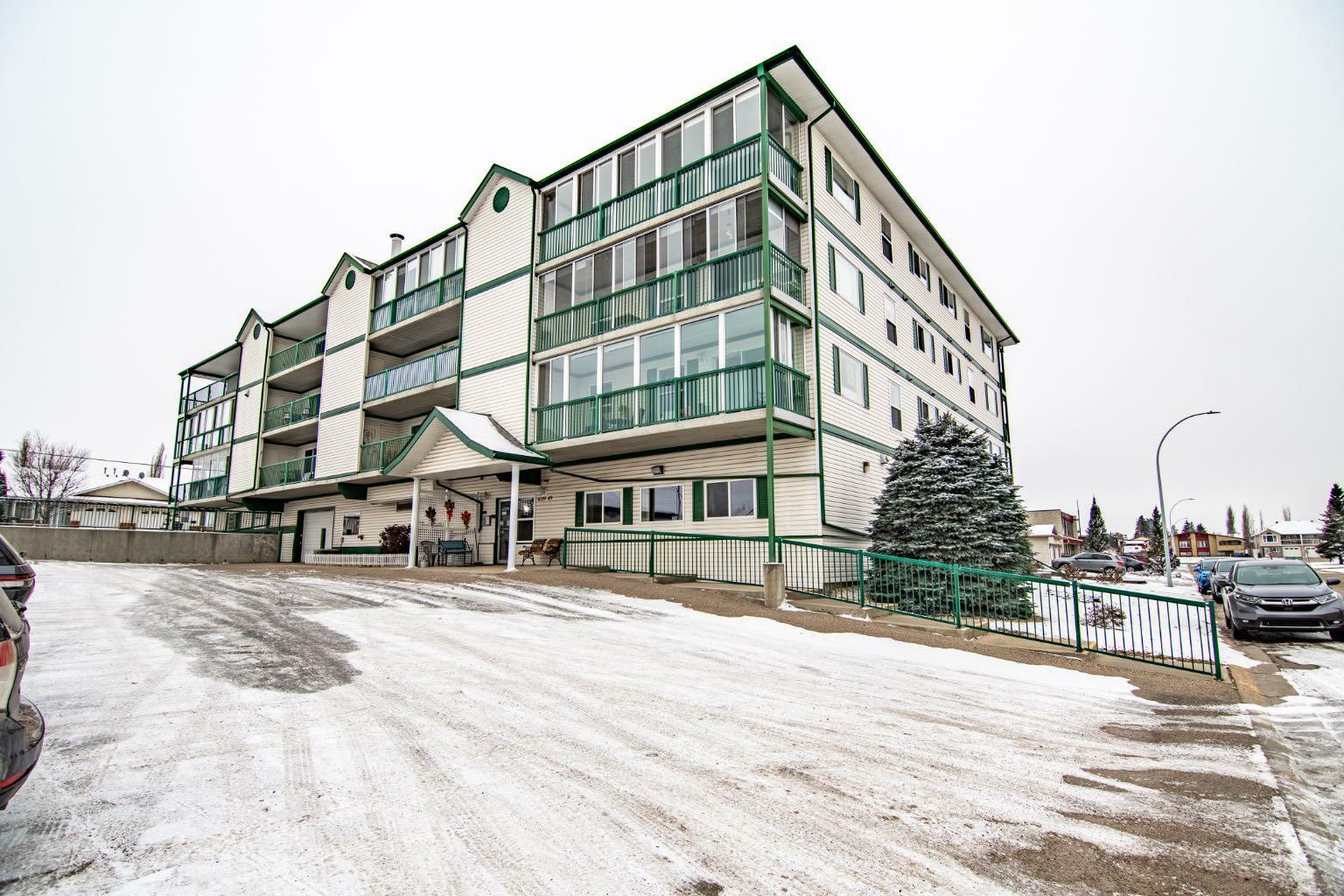 Property Photo:  4319 49 Street 308  AB T4G 1Y4 