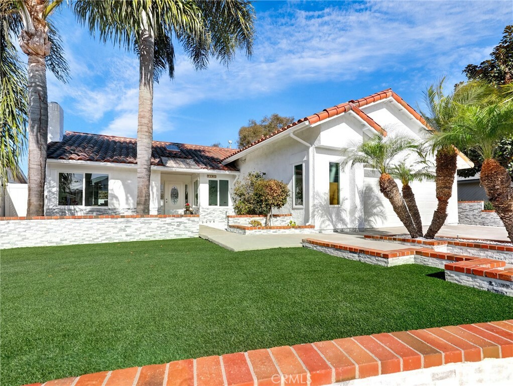 Property Photo:  7191 Sunbreeze Drive  CA 92647 