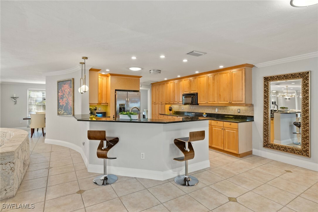 Property Photo: 503 Neapolitan Way FL 34103
