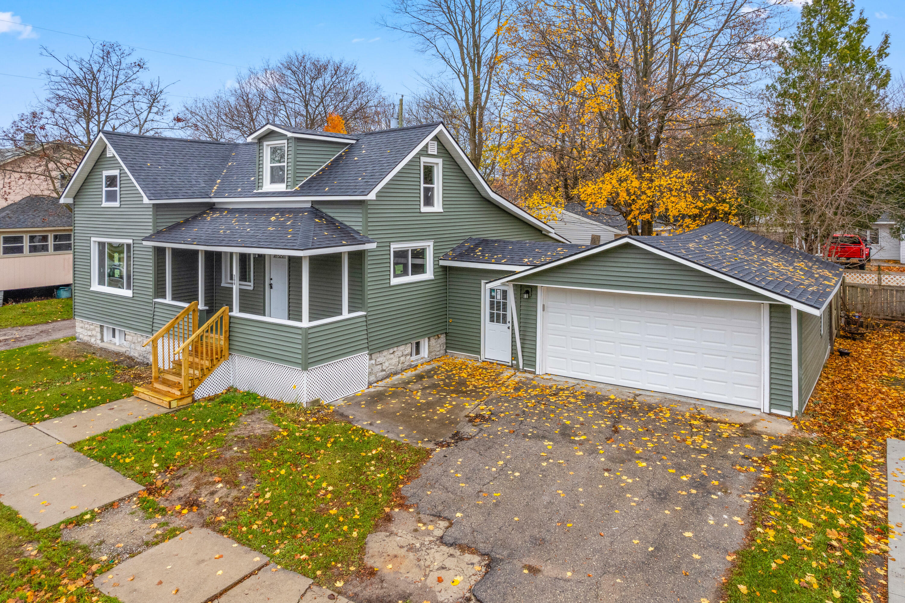 Property Photo:  309 S Fifth Avenue  MI 49707 