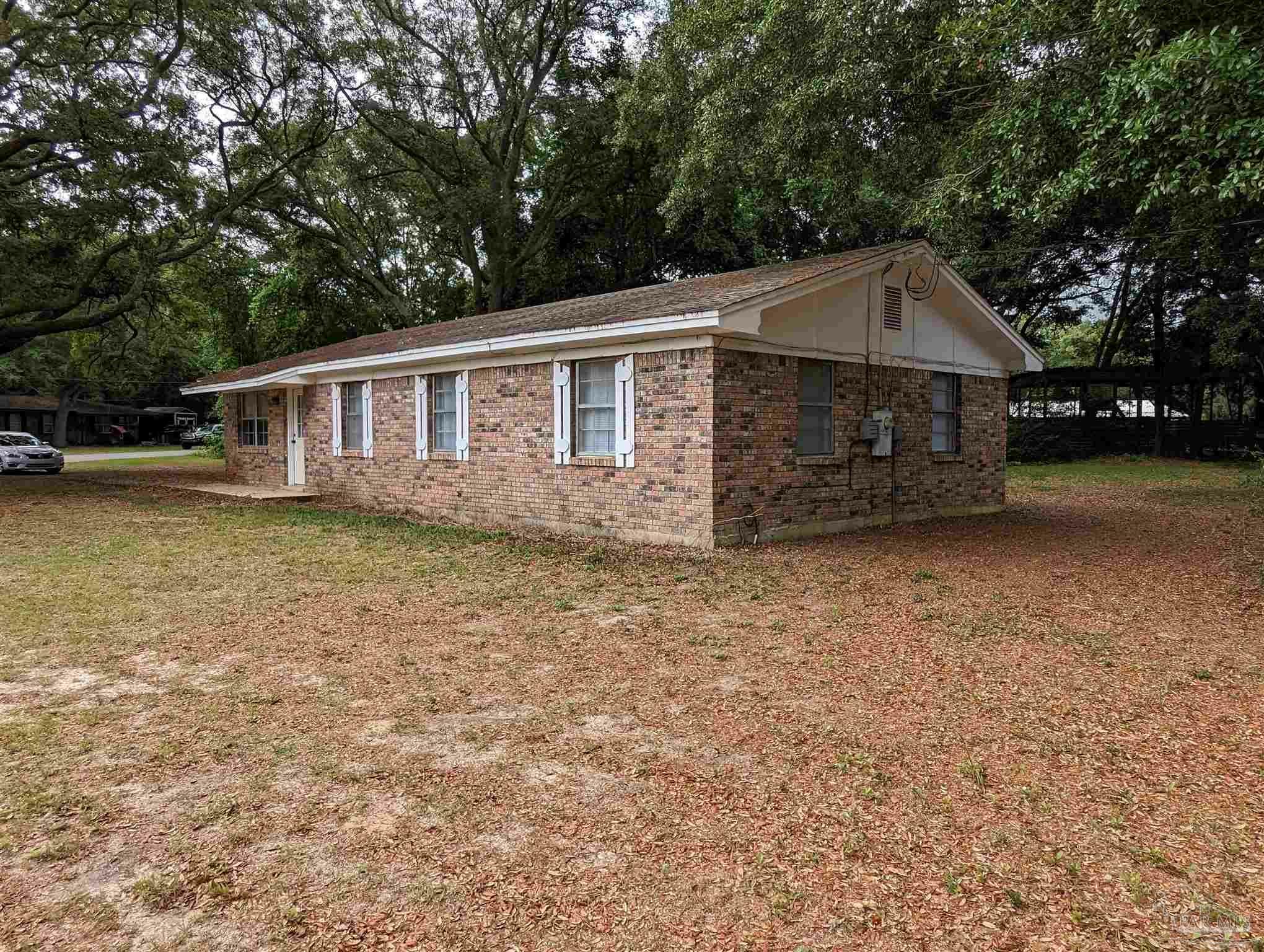 Property Photo:  7551 Causey St  FL 32583 