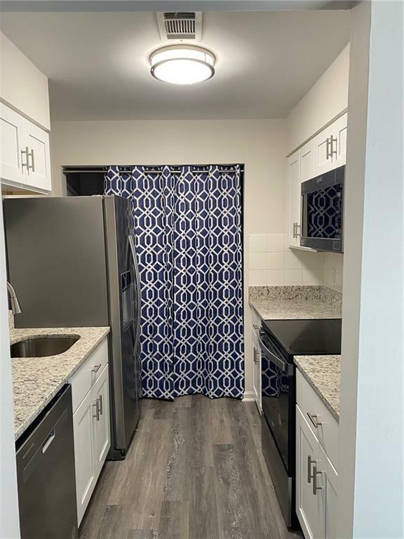 Property Photo: 1166 Booth Road SW 610 GA 30008