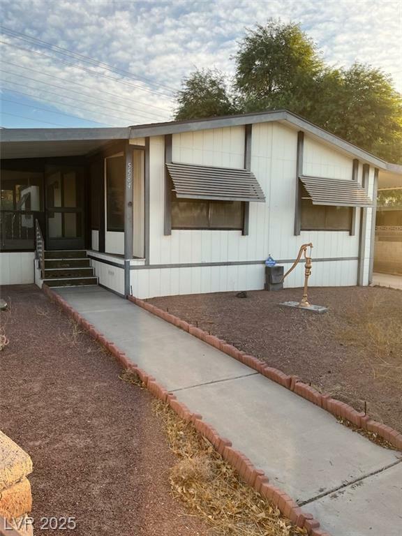 Property Photo: 5584 Aldama Road NV 89122