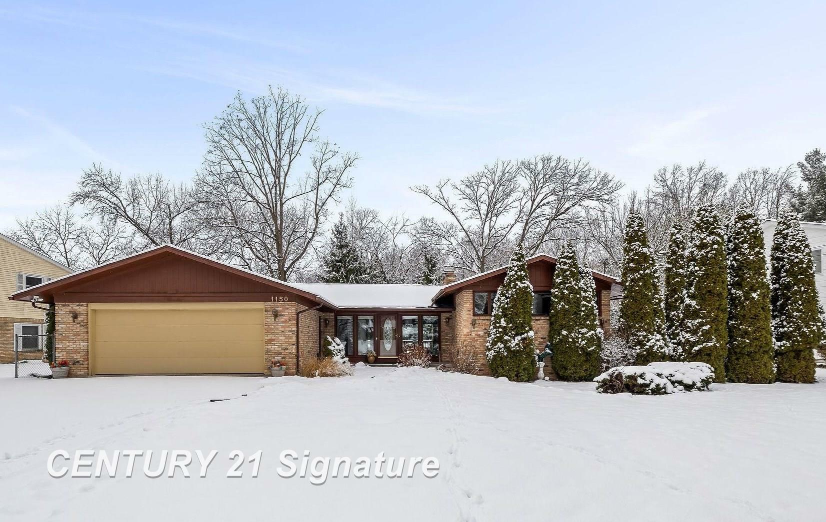 Property Photo:  1150 River Forest Drive  MI 48638 