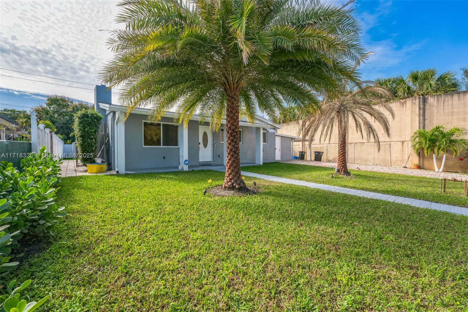 Property Photo:  1034 Almeria Rd  FL 33405 