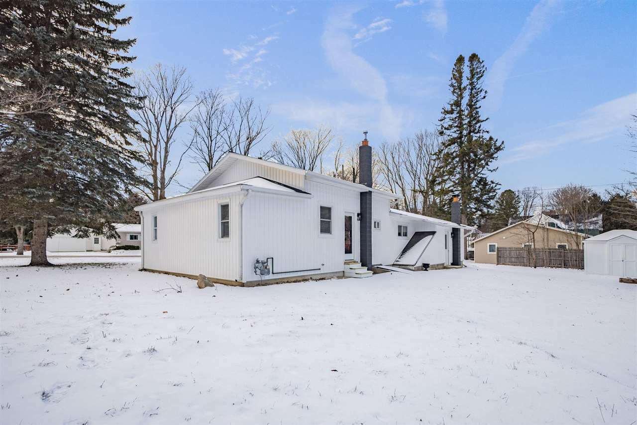 Property Photo:  206 Sheridan  MI 49720 