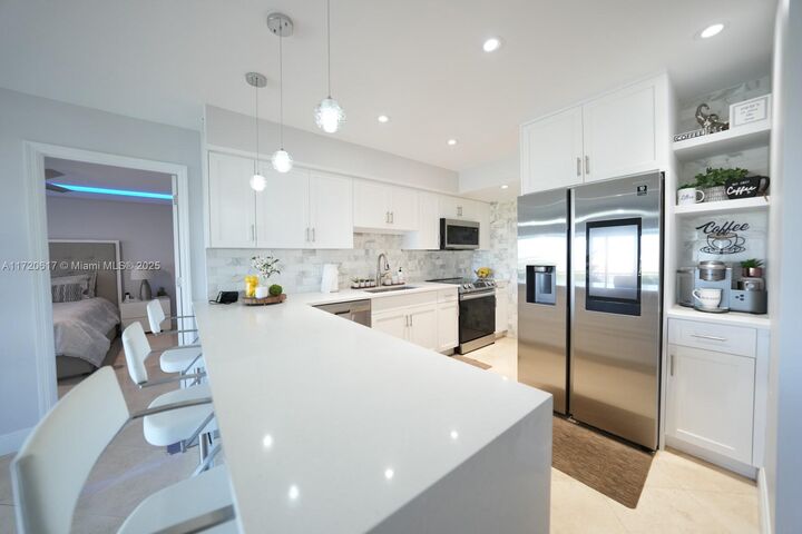 Property Photo: 200 Diplomat Pkwy 827 FL 33009