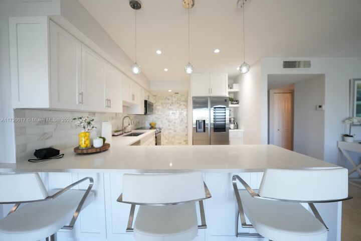 Property Photo:  200 Diplomat Pkwy 827  FL 33009 