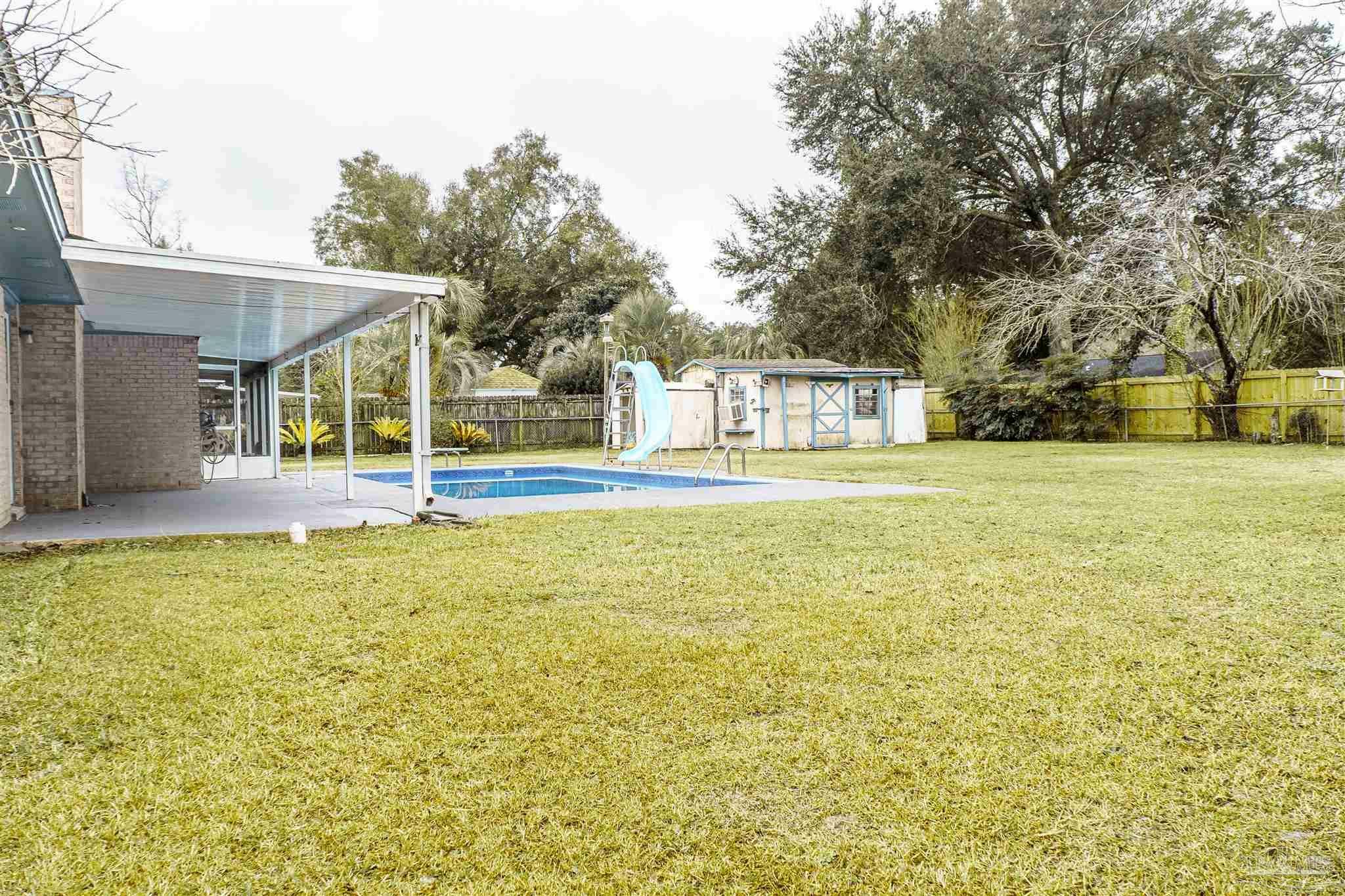 Property Photo:  4655 Gregg Ave  FL 32571 