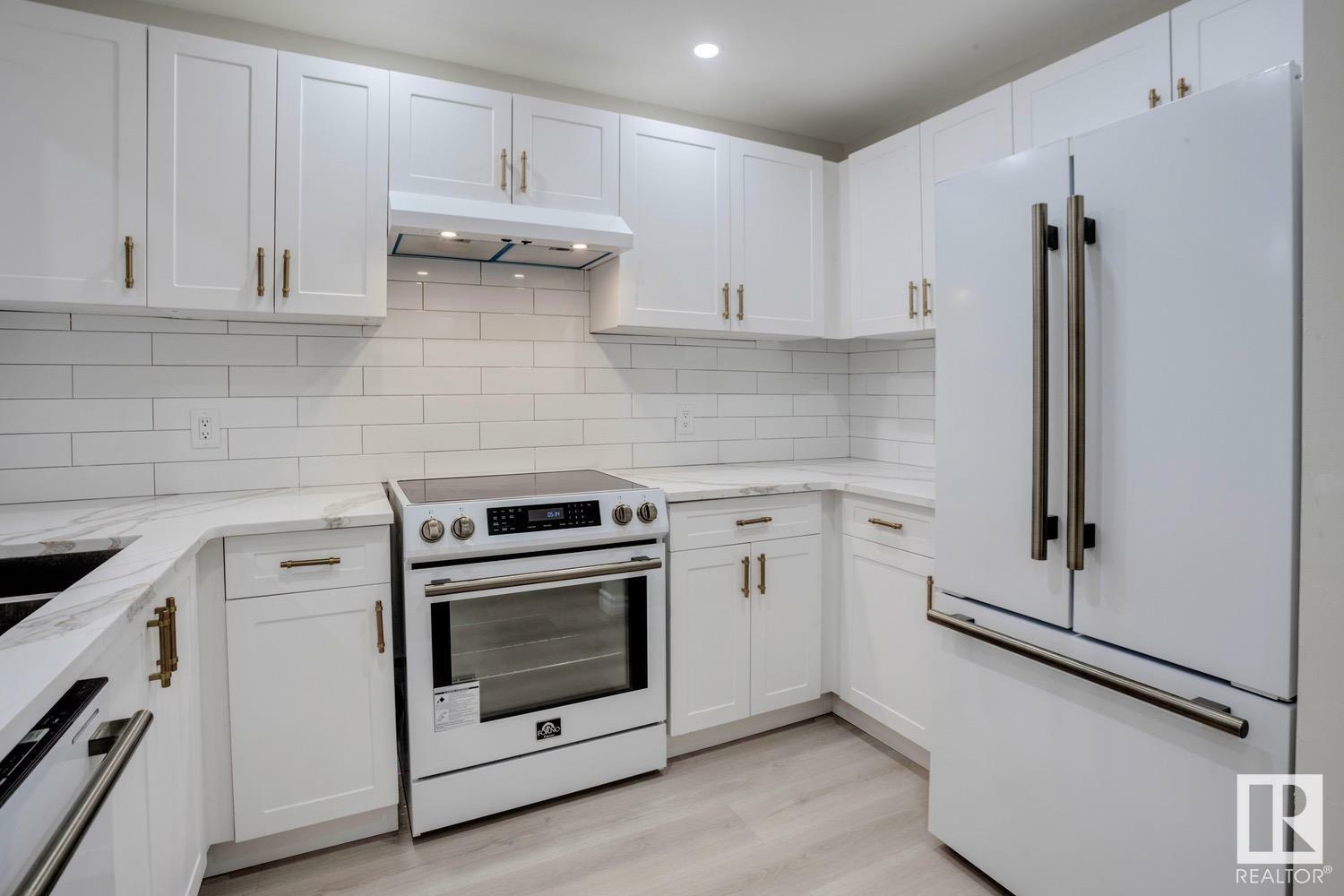 Property Photo:  14908 26 Street NW 303  AB T5Y 2G4 