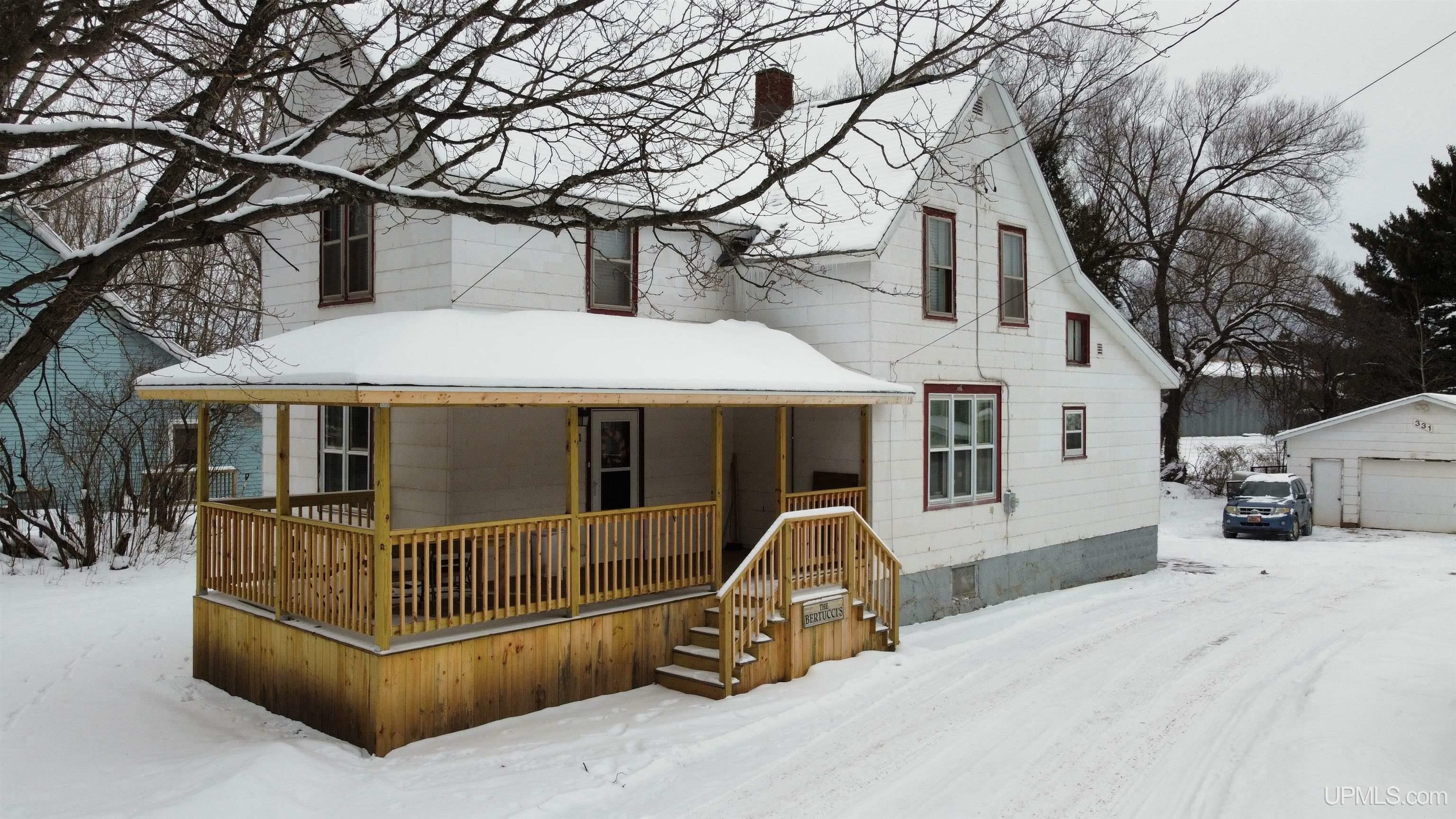 Property Photo:  331 Carp Street  MI 49849 