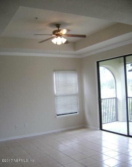 Property Photo:  405 La Travesia Flora 201  FL 32095 