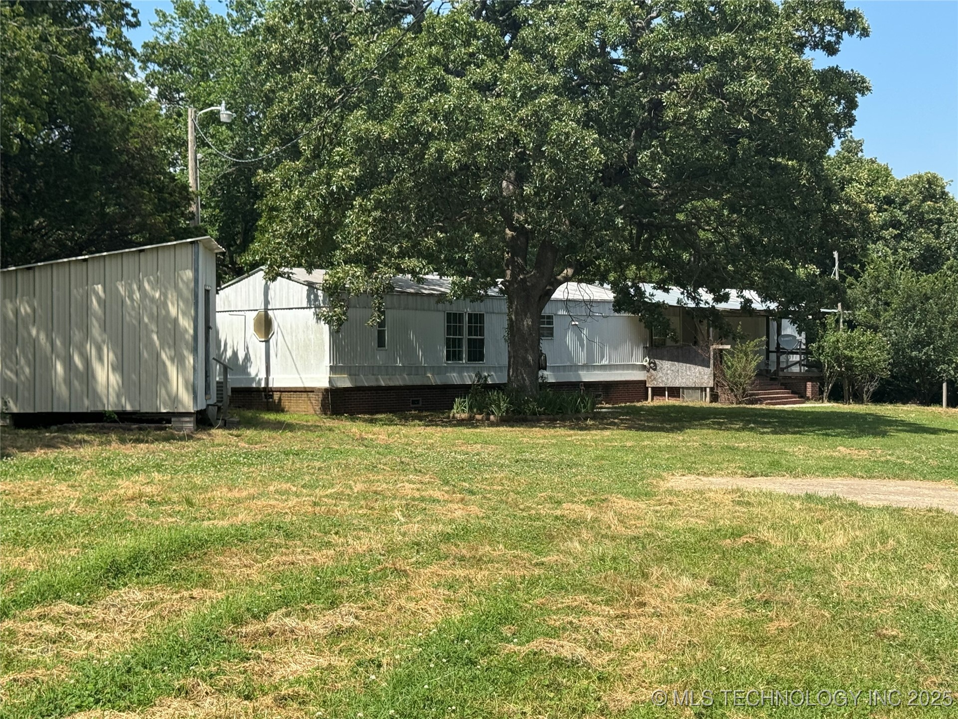 Property Photo: 6935 W 67th Street OK 74126