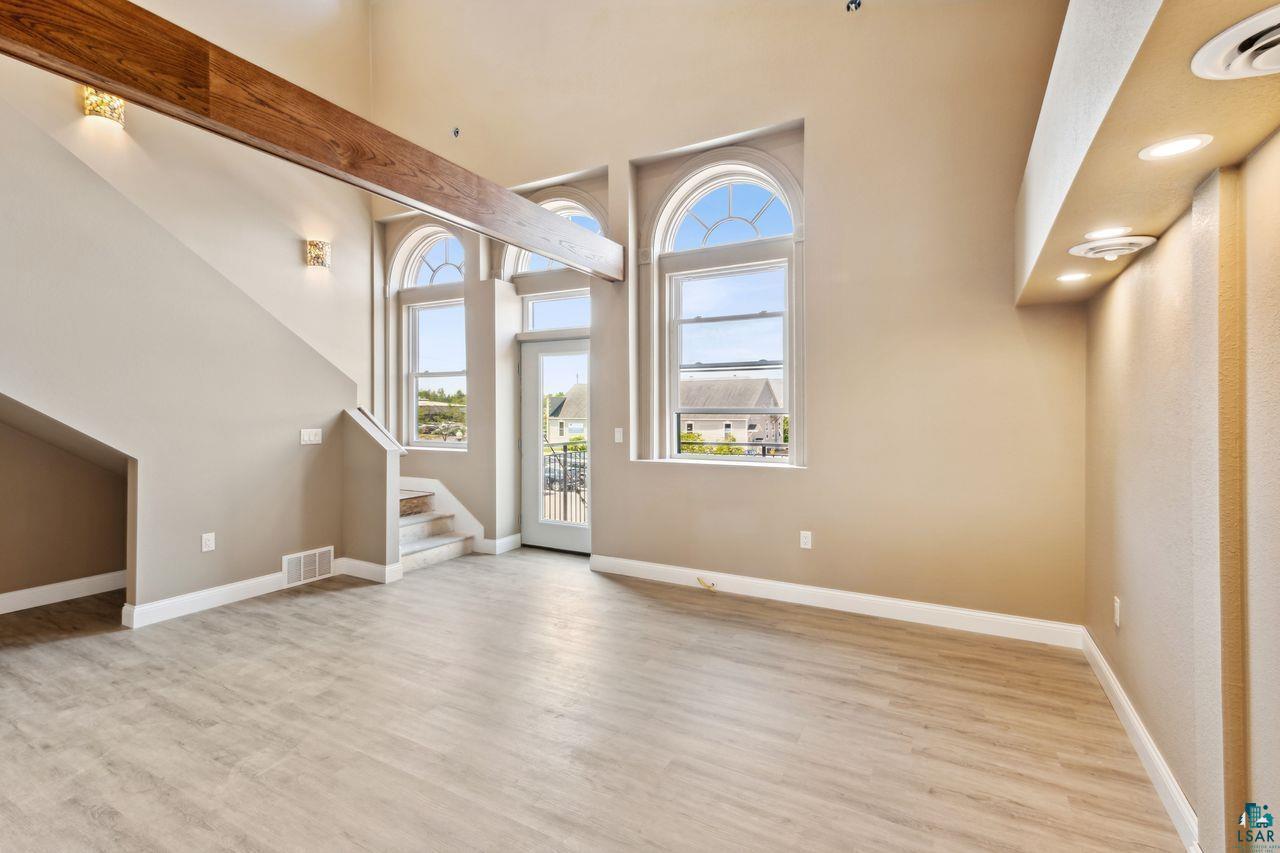 Property Photo: 208 3rd Ave W Unit 201 WI 54806