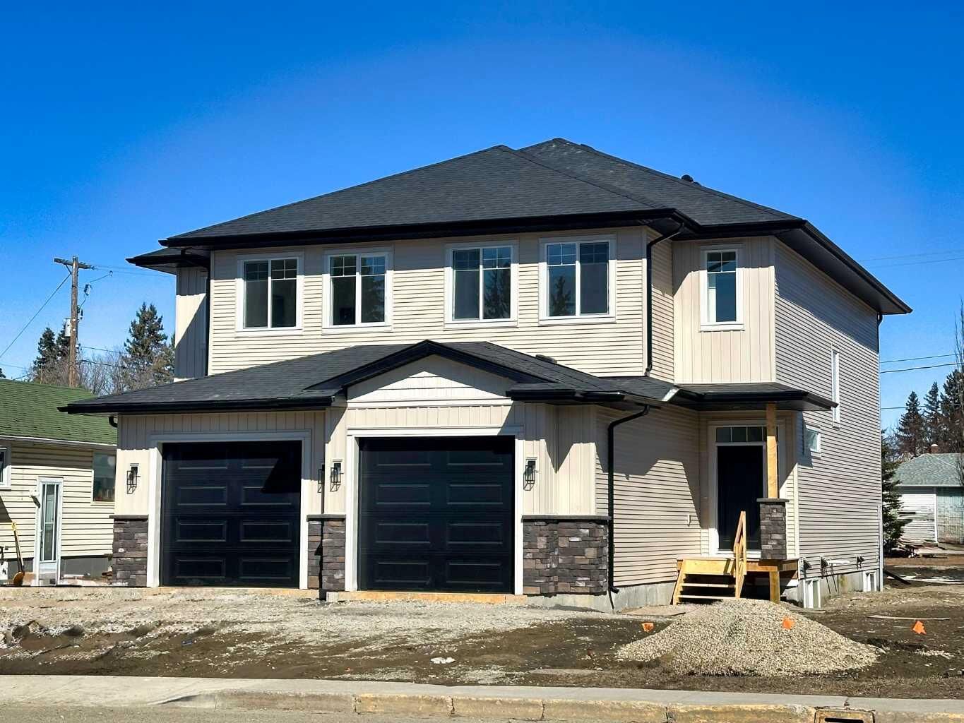 Property Photo: 5202 50 Street AB T4H 1H2