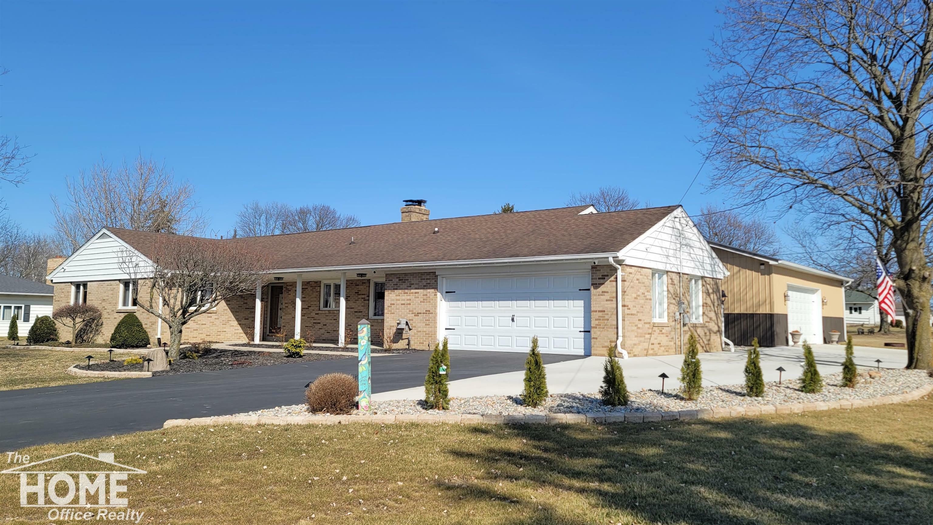 Property Photo:  200 Elmwood Drive  MI 48817 