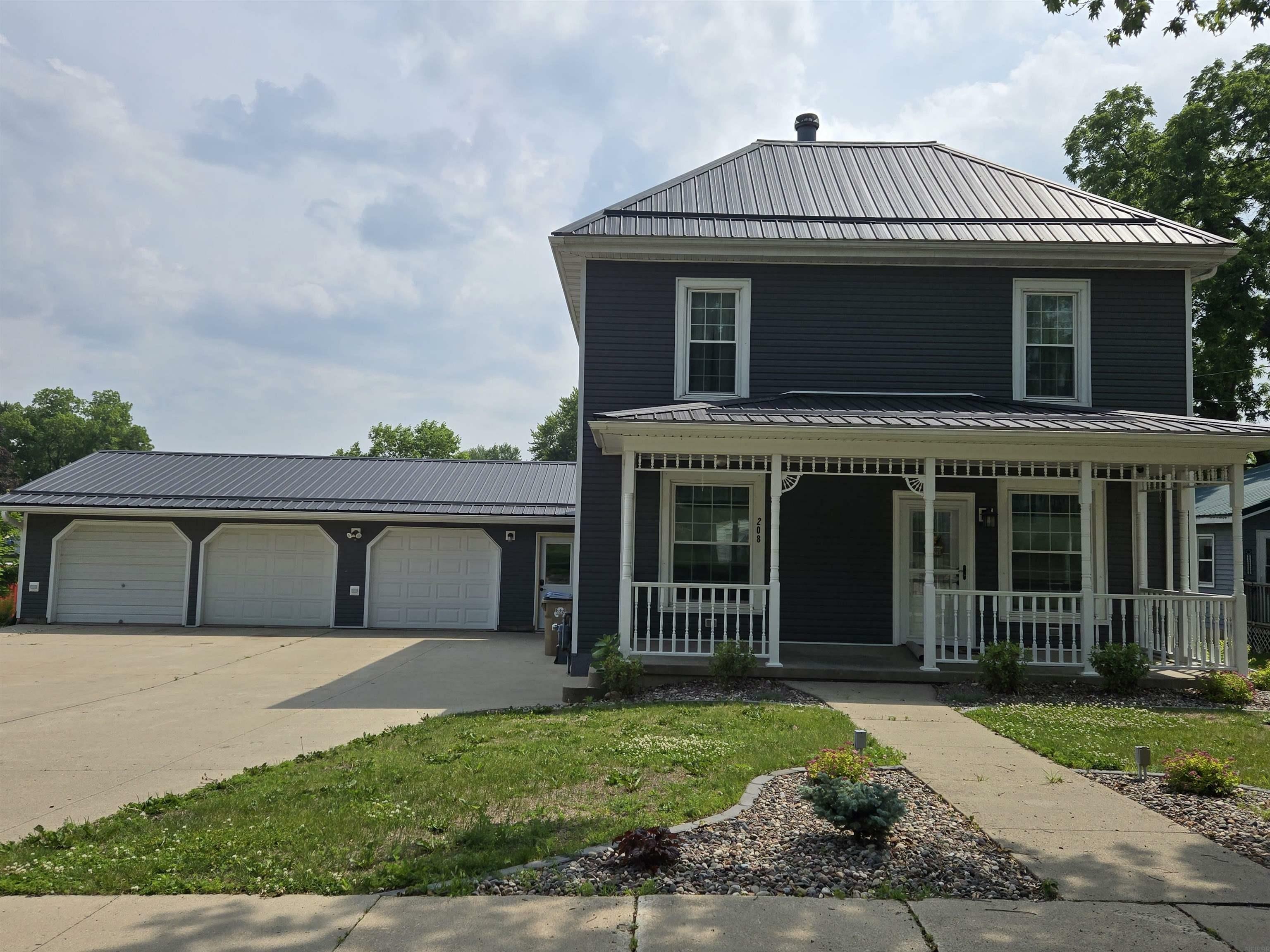 Property Photo: 208 W Spring Street IA 52076
