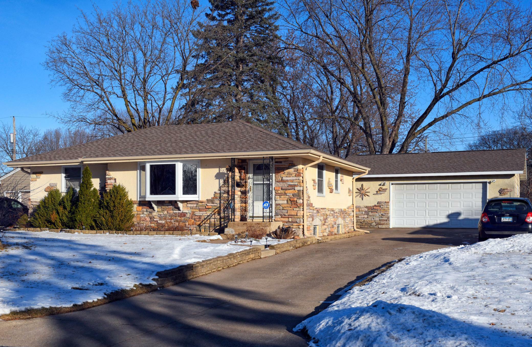 Property Photo:  6312 Lee Avenue N  MN 55429 