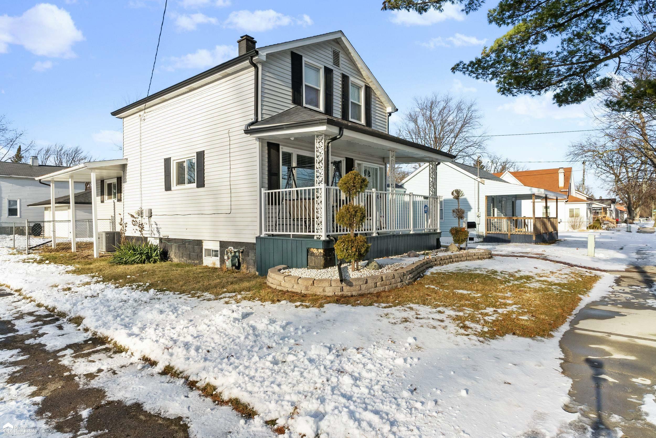 Property Photo:  301 N Bates Street  MI 48602 