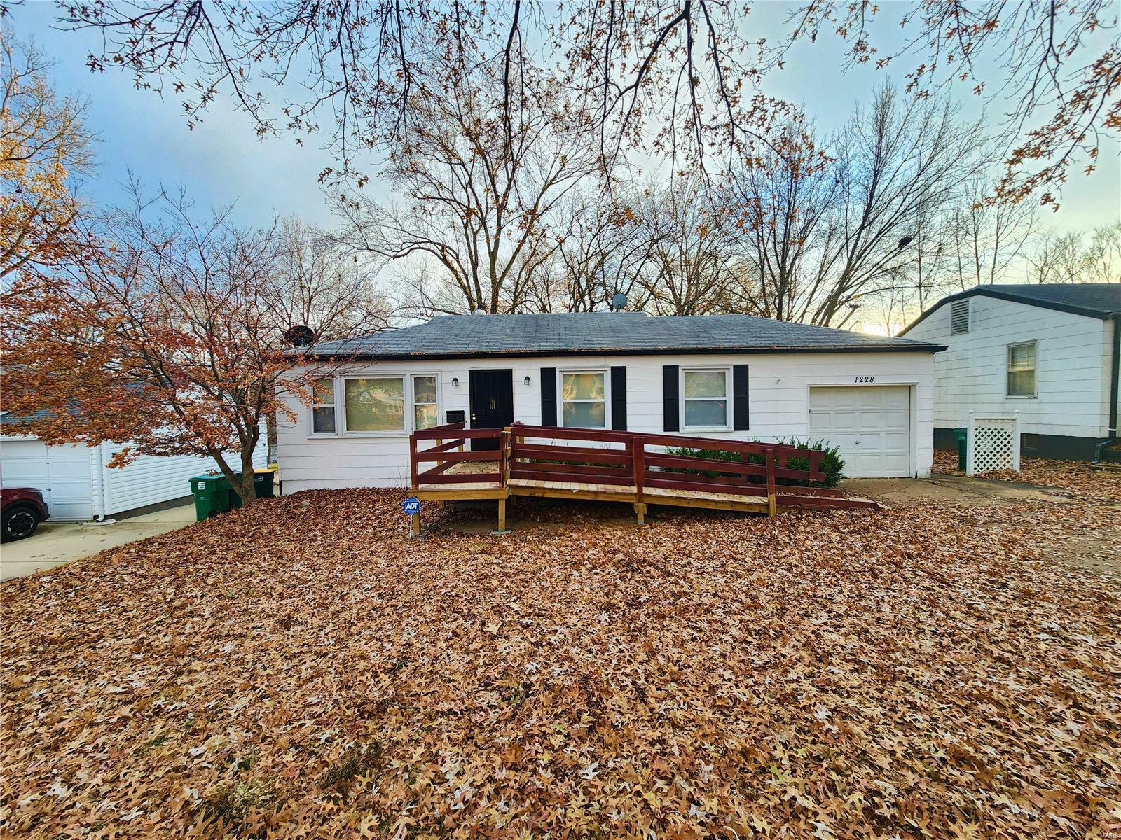 Property Photo:  1228 Avant Drive  MO 63137 