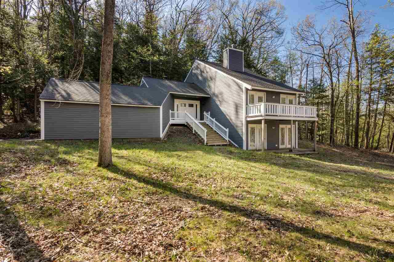 Property Photo:  1458 Timber Pass  MI 49740