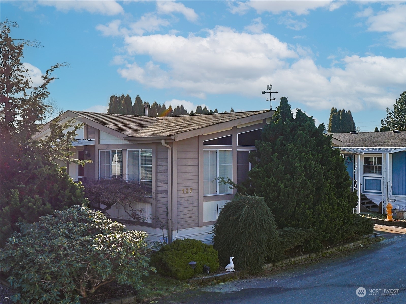 Property Photo:  16600  25th Avenue NE 127  WA 98271 