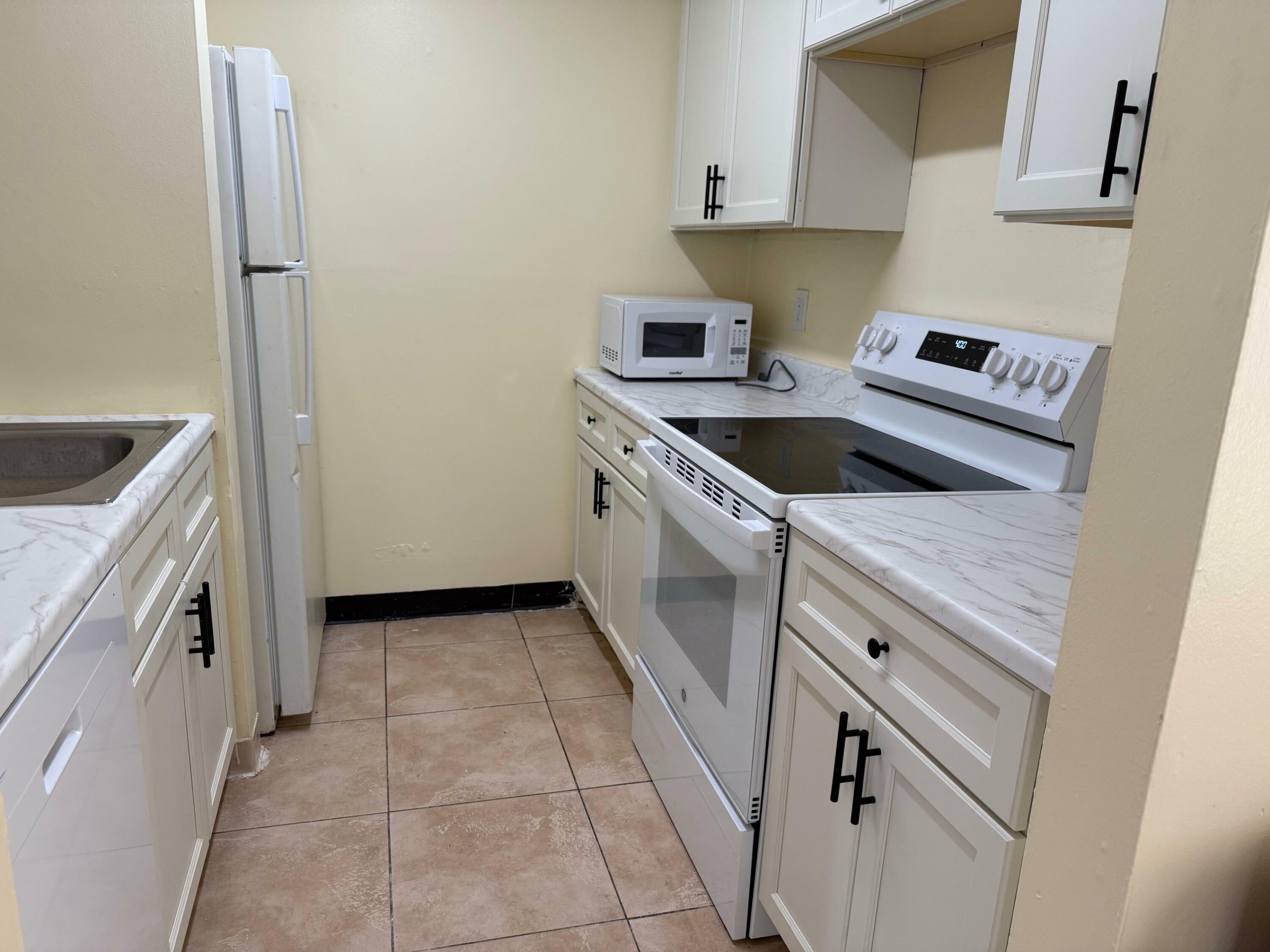 Property Photo:  710 Meadows Circle 710  FL 33436 