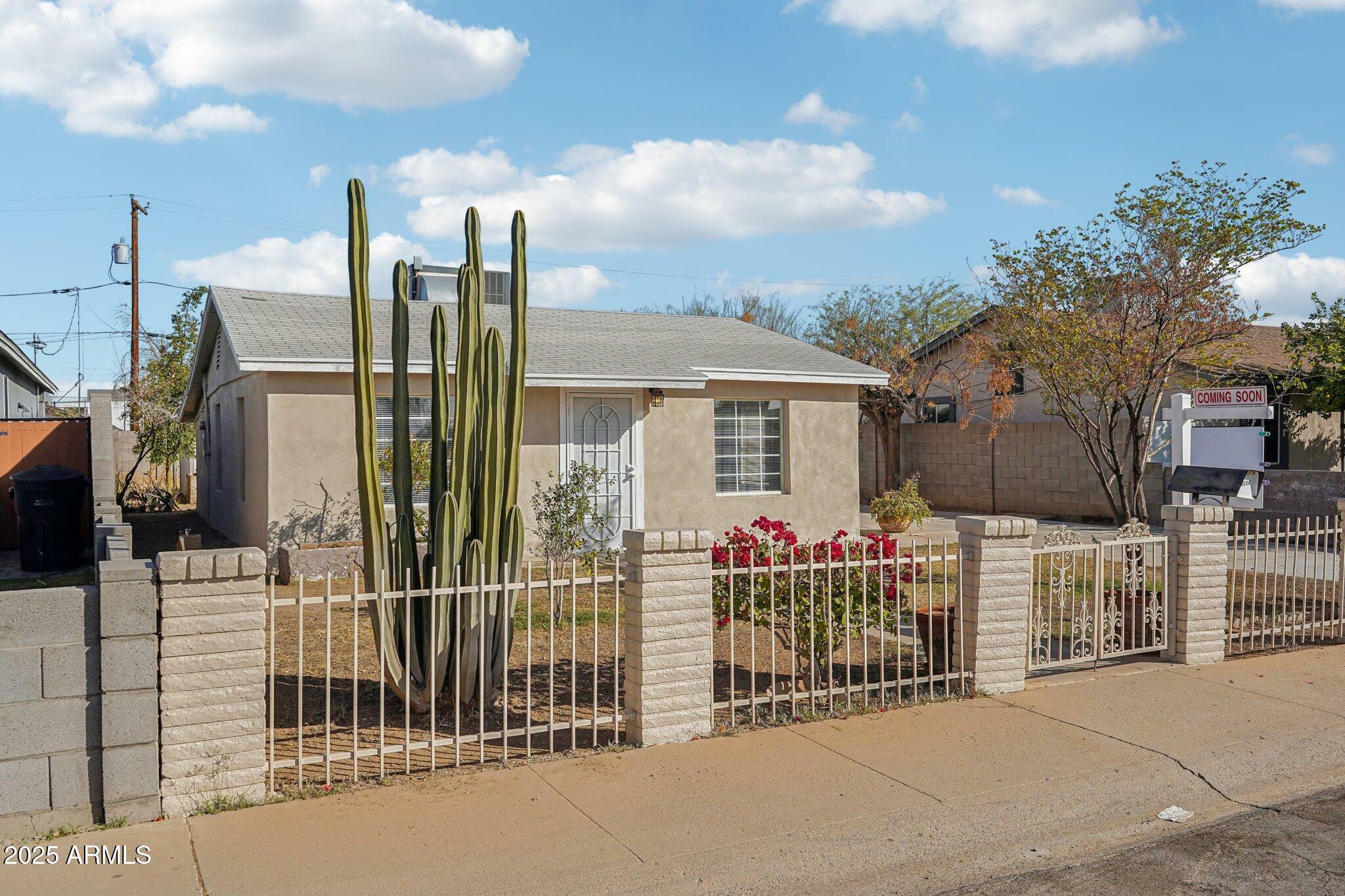 Property Photo:  9156 W Garfield Street  AZ 85353 