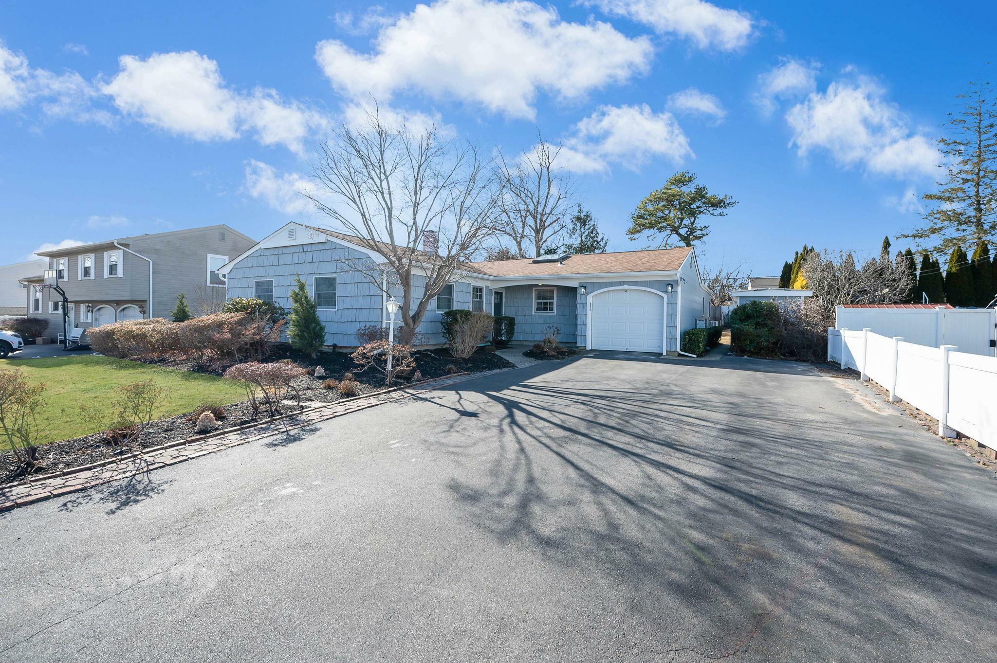 Property Photo: 212 Blue Point Rd W NY 11742