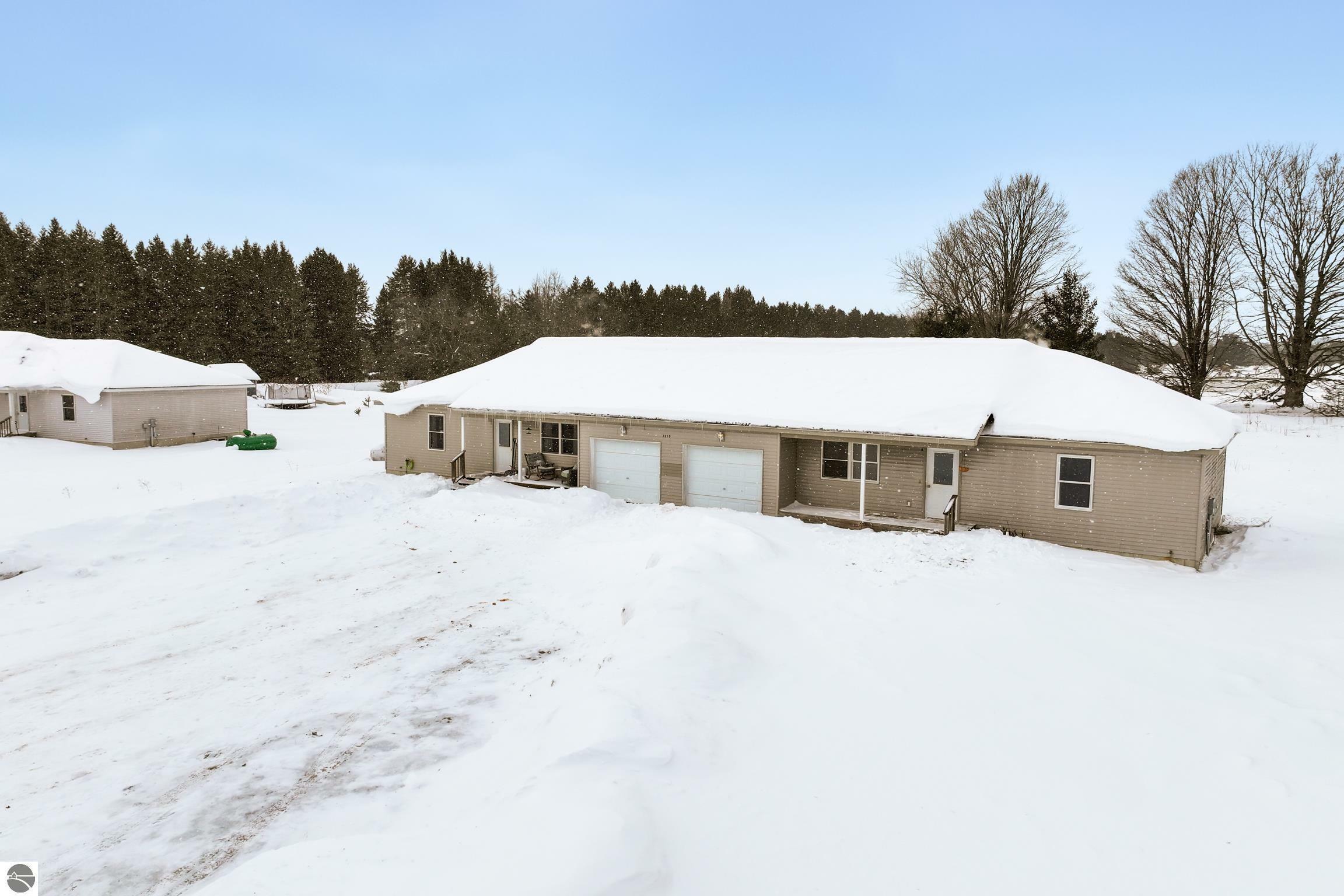 Property Photo:  7310 Tiger Drive  MI 49650 