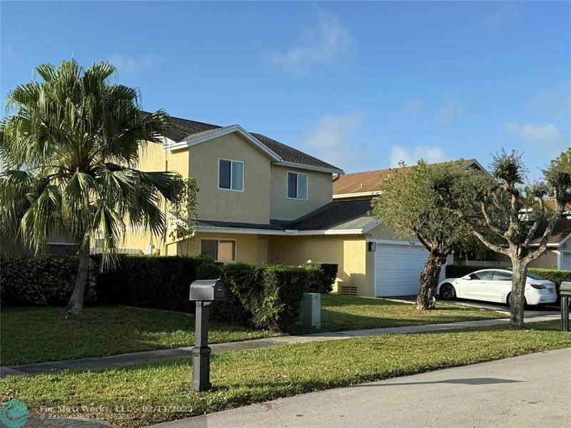 Property Photo:  9920 SW 12th St  FL 33025 