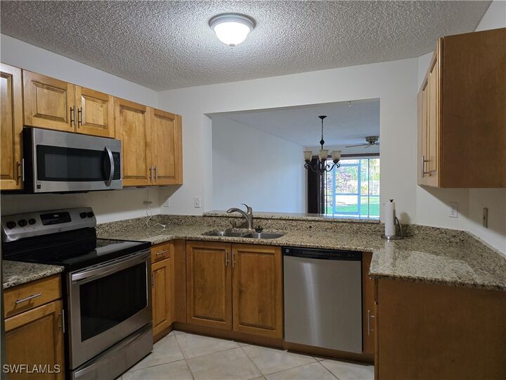 Property Photo: 5737 Whitaker Road C104 FL 34112