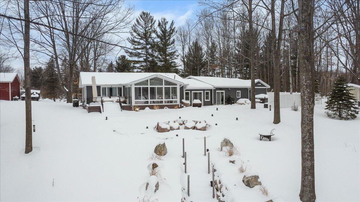 Property Photo:  9356 Miramichi Drive  MI 49631 