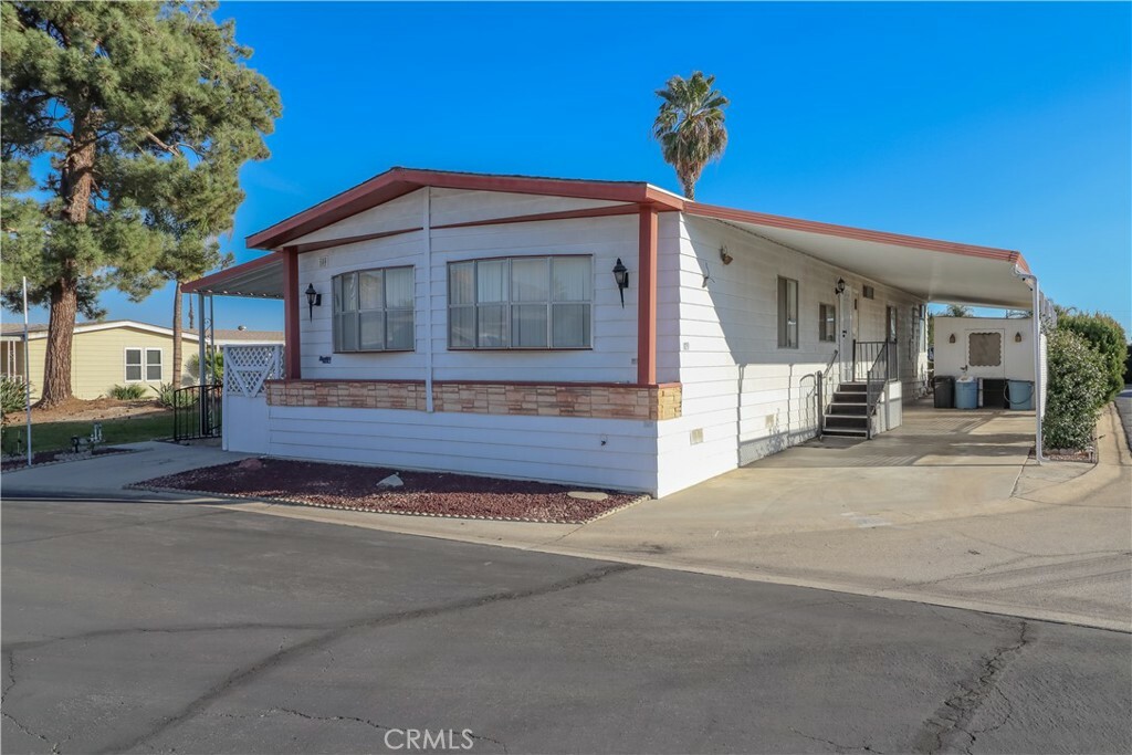 Property Photo:  23820 Ironwood Avenue 109  CA 92557 