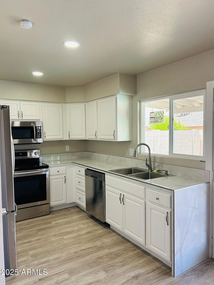 Property Photo:  4038 E Burgess Lane  AZ 85042 