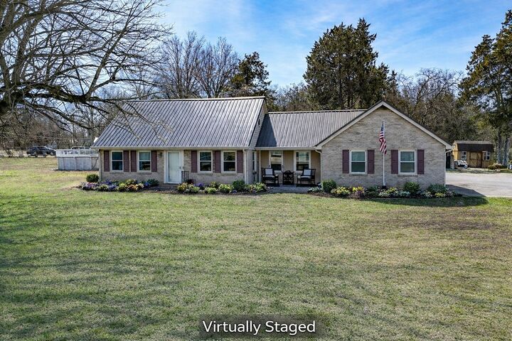 Property Photo:  1621 Highway 41A N  TN 37160 