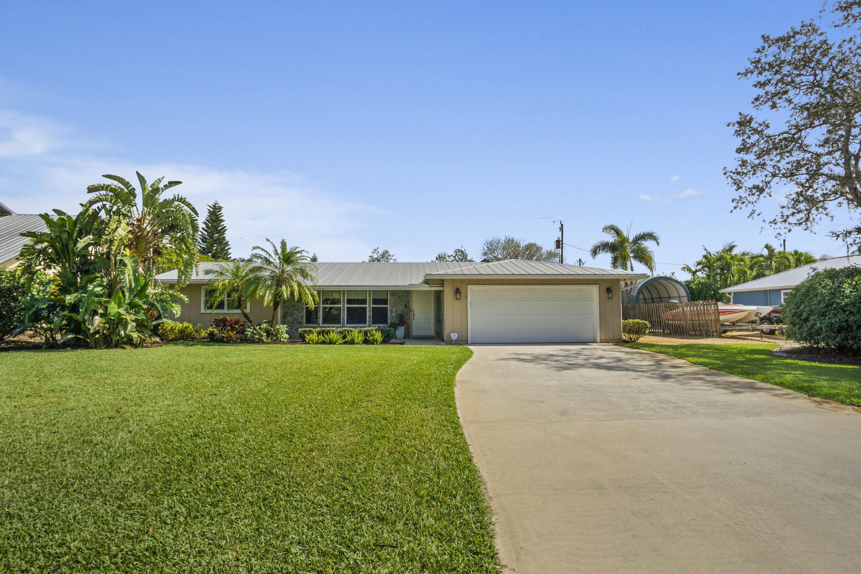 Property Photo: 707 SW Hidden River Avenue FL 34990