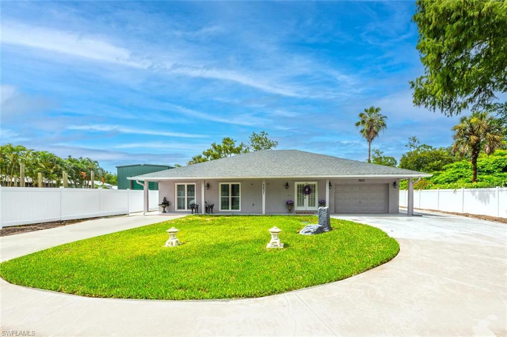 Property Photo: 5831 Dogwood Way FL 34116