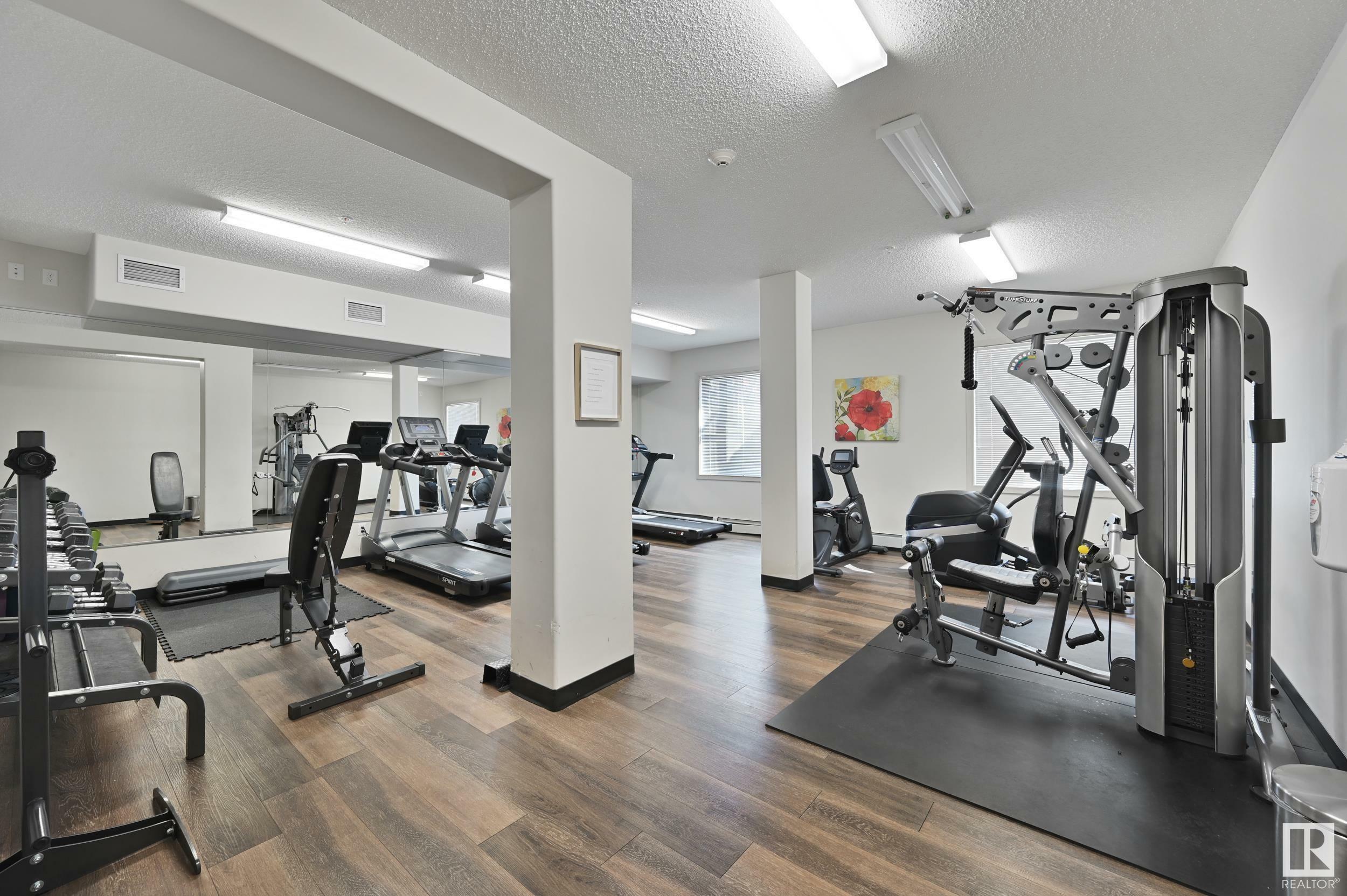 Property Photo: 320 Ambleside Link SW 305 AB T6W 2Z9
