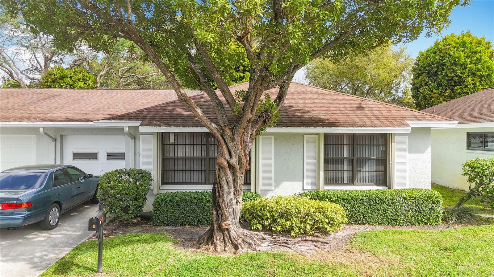 Property Photo:  9780 Pecan Tree Drive B  FL 33436 