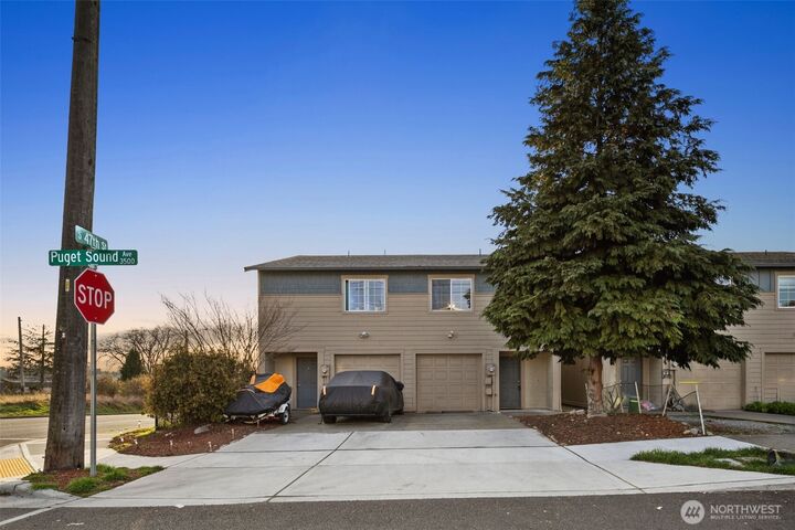 Property Photo:  4560 S Puget Sound Avenue  WA 98409 