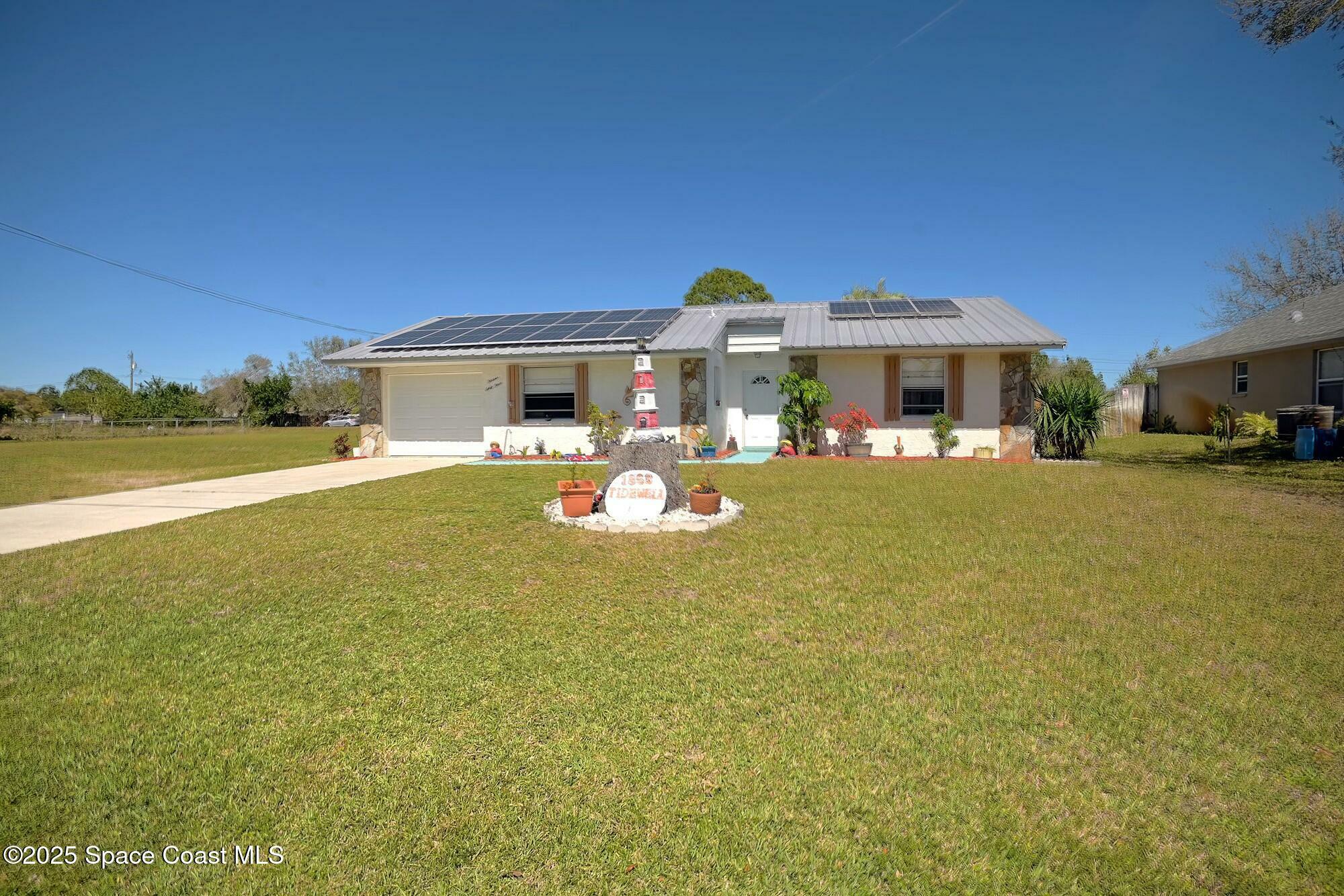 Property Photo: 1363 Tidewell Street SE FL 32909