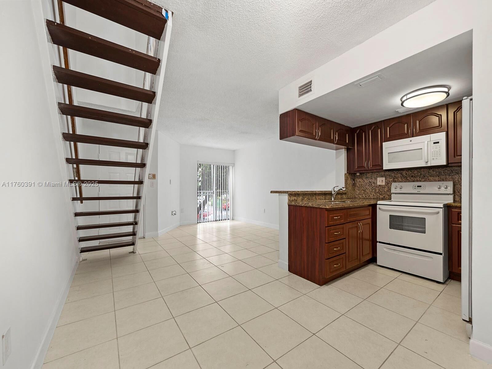 Property Photo:  8585 NW 6th Ln 9-208  FL 33126 