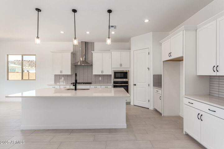 Property Photo: 24116 N 172nd Avenue AZ 85387