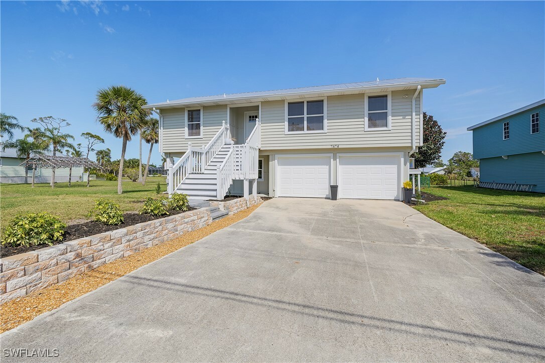 Property Photo:  7674 Caloosa Drive  FL 33922 