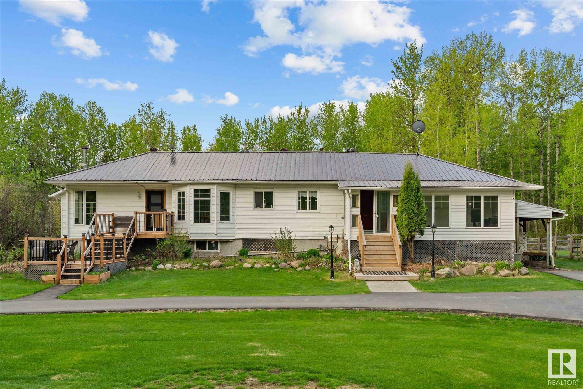 Property Photo: 54113 Rge Road 13 4 AB T7Y 0J2