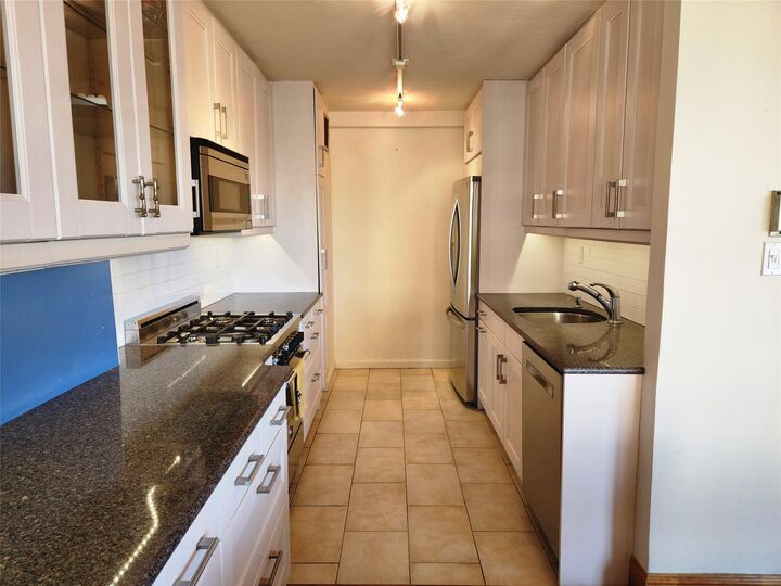 Property Photo: 18-15 215th Street 6 M NY 11360