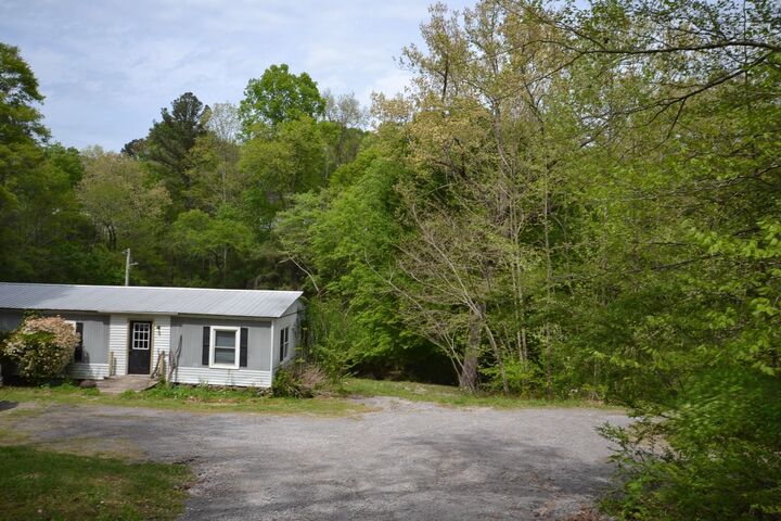 Property Photo:  1509 3rd Ave NE  AL 35179 - VINEMONT 