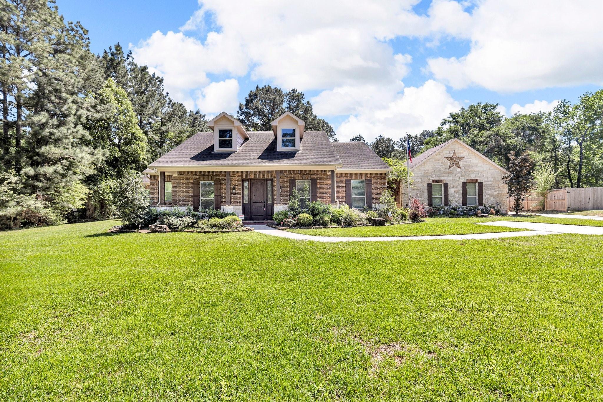 Property Photo:  9122 Grand Lake Estates Drive  TX 77316 