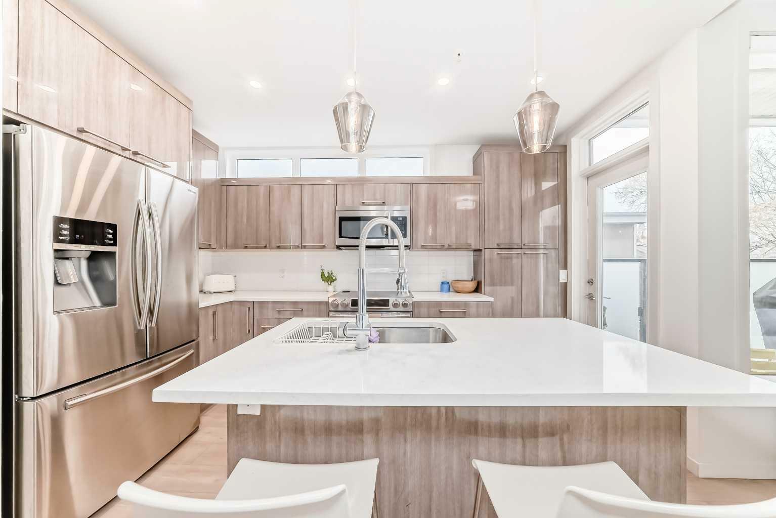 Photo de la propriété: 317 22 Avenue SW 311 AB T2S 3H6